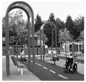 In this figure we observe one wheelchair use children on ground level accessible route and some are playing with ground level play components. 