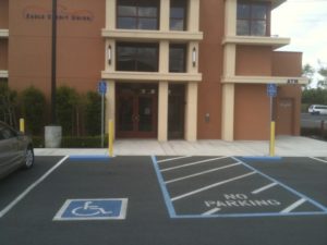 Accessible parking marked in front of a building